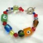 Glass Bead Evil Eye multicolored bracelet 6"  silver tone toggle catch