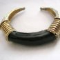 Black enamel gold tone metal spring cuff bracelet 1/2" adjustable
