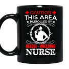 Caution this area patrolled by needle wielding nurse coffee Mug_Black