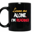 Leave me alone i am reading coffee Mug_Black