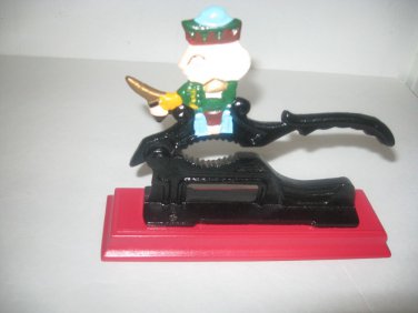 NUT CRACKER WITH FIGURINE HANDLE MADE OUT OF IRON - COLLECTABLE