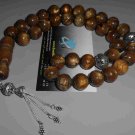 El Yousr, gold rosary natural