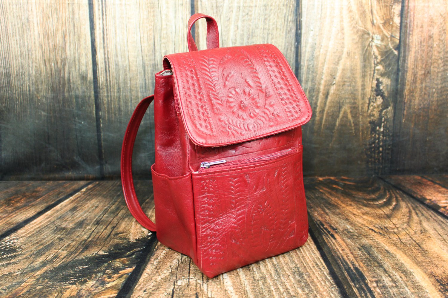 red tooled leather purse