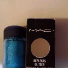 Mac reflects glitter turquoise colour