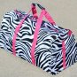 SWDSI1085 - 18" Black & White Zebra Print Duffle Bag w/ Pink Trim