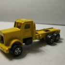 Vintage Diecast car: 2.75" Yellow Semi-TrucK { cracked on rear of cab at bottom }