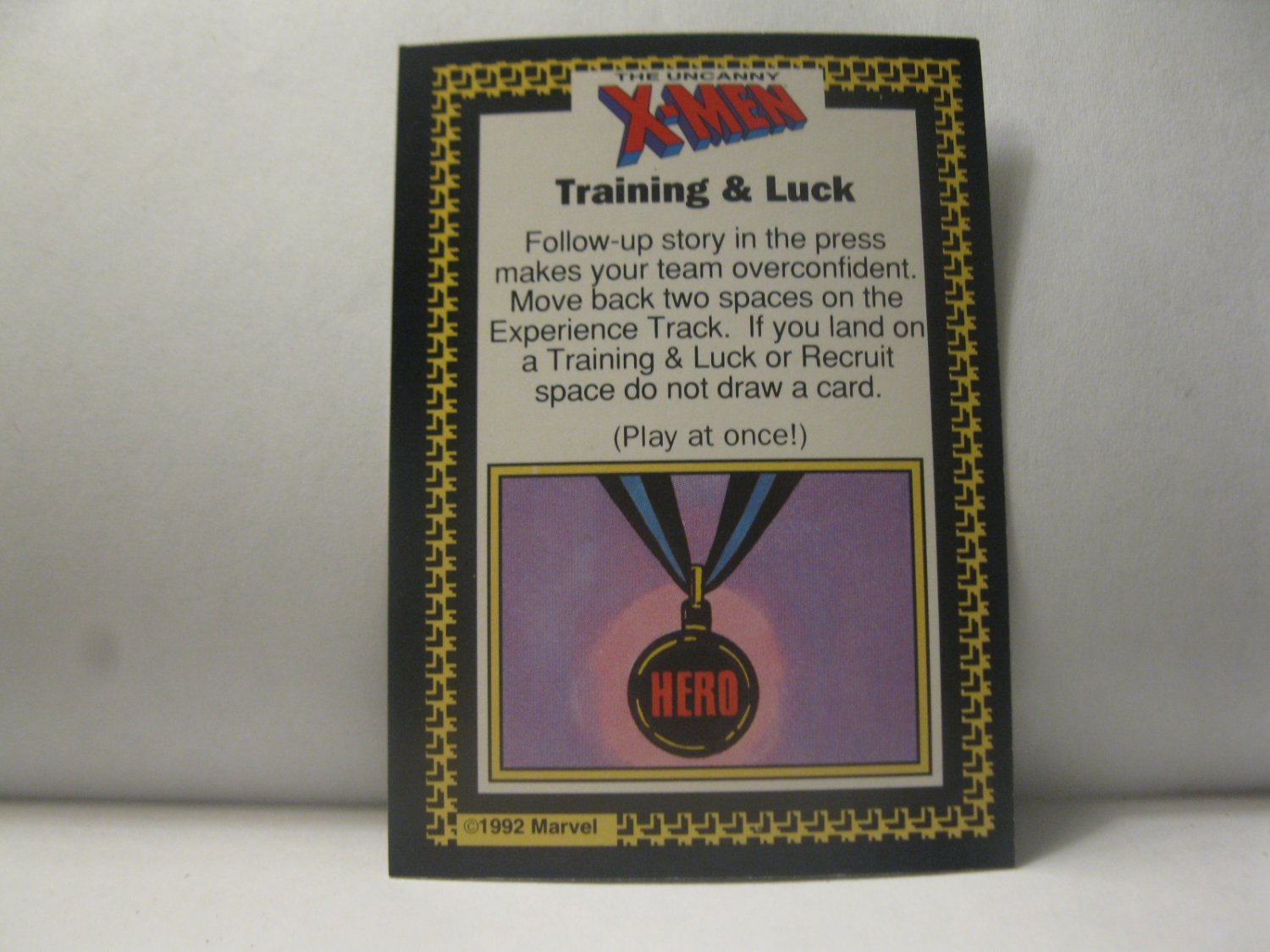 1992 Uncanny X-Men Alert! Board Game Piece: Training & Luck Card- Good Press Story
