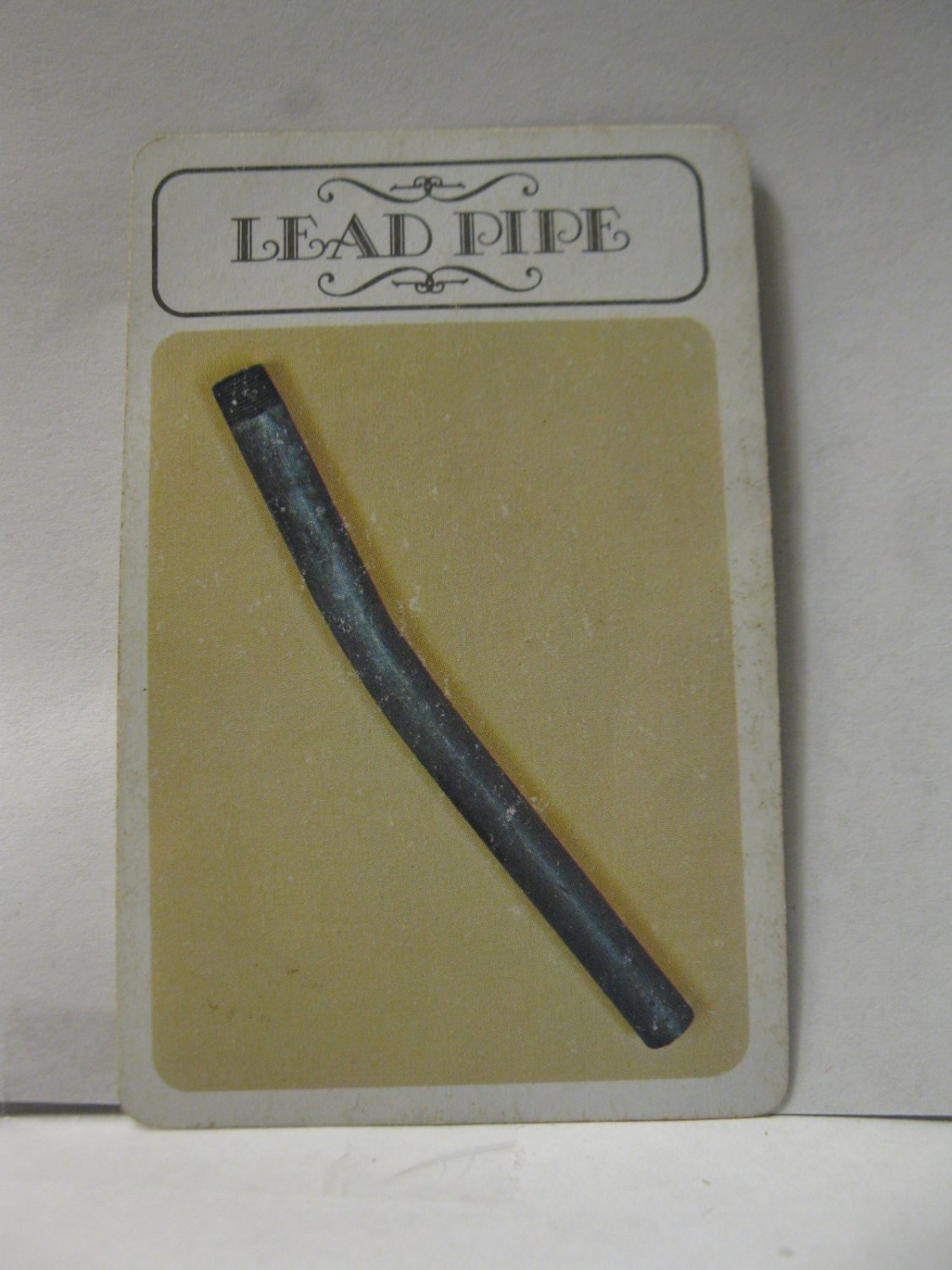 1979 Clue Board Game Piece: Lead Pipe Weapon Card