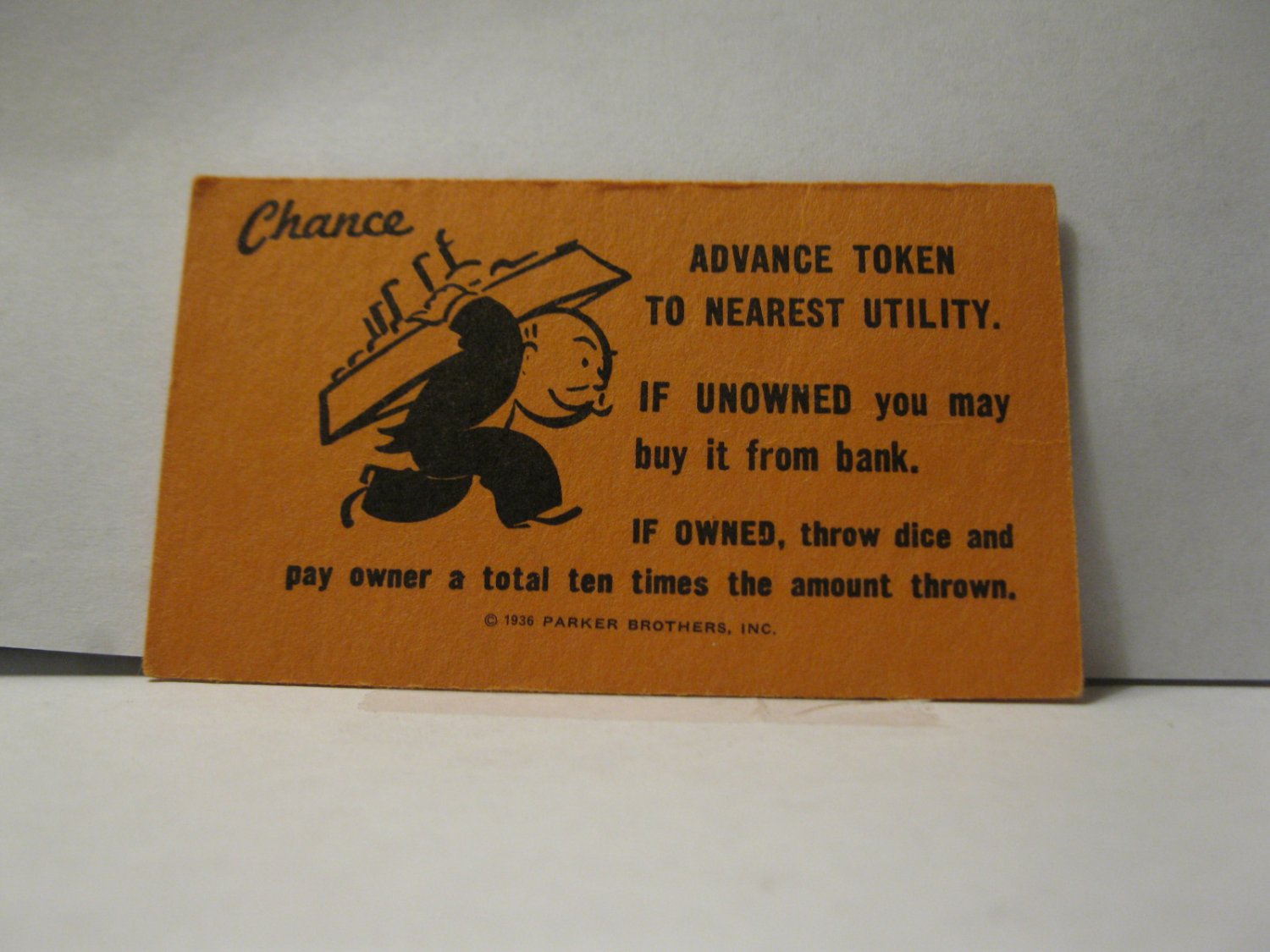 1985 Monopoly Board Game Piece: Advance to Nearest Utility Chance Card