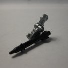Vintage action figure part: small silver arm w/ black missile