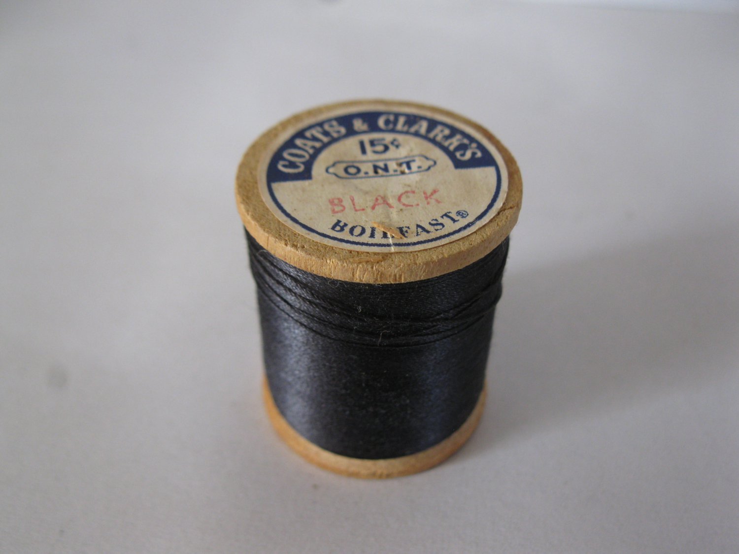 #21 old wood Spool w/ Thread: Coat's & Clark's Boilfast - Black