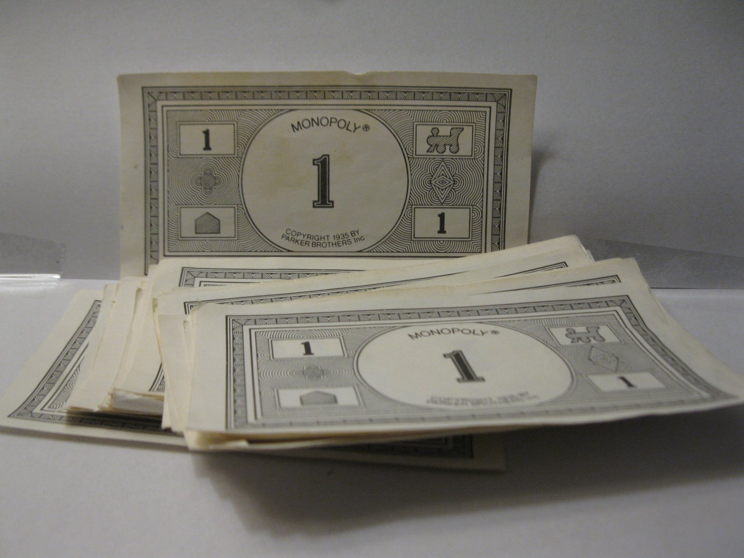 Board Game Piece: Monopoly - Lot of (10) $1 bills