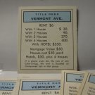 Board Game Piece: Monopoly - random Vermont Ave. Title Deed
