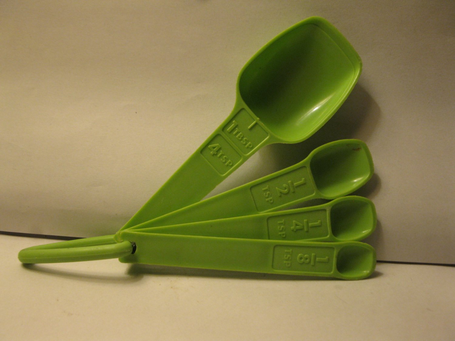 vintage Tupperware Lime Green Measuring Spoons set of 4