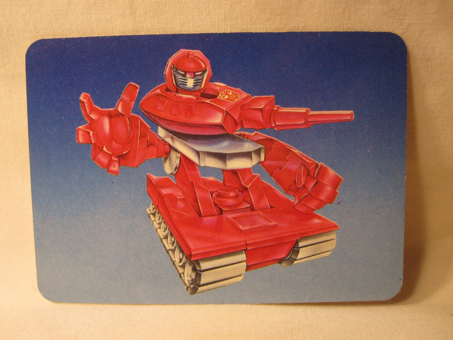 1985 Transformers Action trading card #31: Warpath (blue)