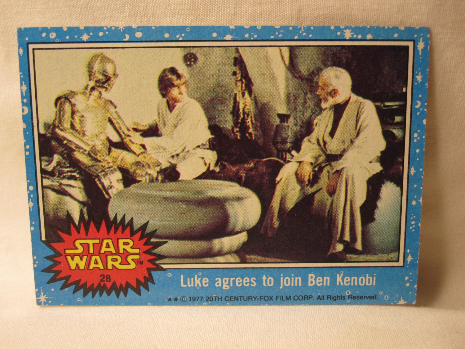 1977 Star Wars - a New Hope Trading Card #28: Luke agrees to join Ben Kenobi