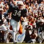 Bo Jackson Autographed 16x20 Horizontal Running *Drk Photo- JSA W Authenticated