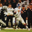 John Elway Autographed 16x20 Against Raiders Photo- JSA Authenticated
