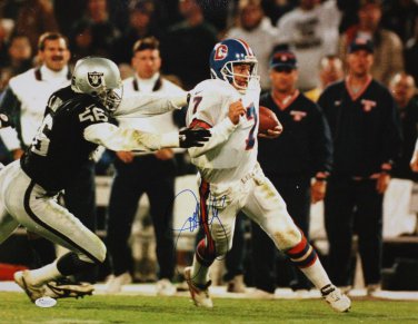 John Elway Autographed 16x20 Against Raiders Photo- JSA Authenticated