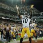 Santonio Holmes Autographed 16x20 Ball Toss Photo- JSA Authenticated