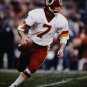 Joe Theismann Autographed 16x20 Looking To Pass Photo- JSA Authenticated