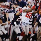 Mario Manningham Autographed 16x20 Vertical Catch Photo- JSA Authenticated