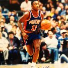 Isiah Thomas Autographed 16x20 Pistons Dribbling Photo- PSA/DNA Authenticated