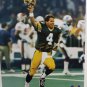 Brett Favre Autographed 16x20 Running with Helmet Photo- FAVRE Authenticated