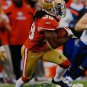 Dashon Goldson Autographed 8x10 Vertical Running Photo- JSA Authenticated