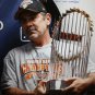 Bruce Bochy Autographed 16x20 With WS Trophy Photo- JSA W Authenticated