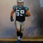 Luke Kuechly Autographed 16x20 Running On Field Photo- JSA W Authenticated
