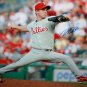 Roy Oswalt Autographed 16x20 Phillies Pitching Photo- JSA Authenticated