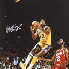 Magic Johnson Autographed 16x20 In Air w/ Houston Photo- JSA Authenticated