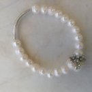 White freshwater pearl with pearl flower feature bracelet