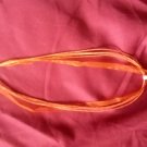 Orange organza and hemp necklace with glass heart