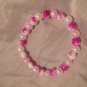 2 pink and white marble bracelets