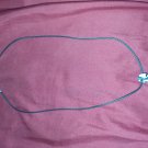 Black necklace with charm