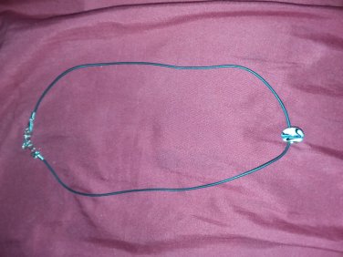 Black necklace with charm