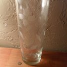 Carved Vintage glass vase With floral patterns.