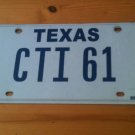 TX vanity CTI 61 license plate name Chris Claude Claudia Camille Cinthya Conan
