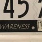AUTISM SPEAKS Awareness license plate 2445 ASP Autistic Child Cure Puzzle Ribbon