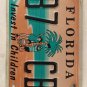 FL CELEBRATE CHILDREN KIDS CHILD Abuse license plate Speak Up Family Coconut