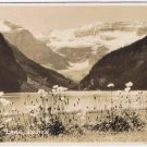 Postcard RPPC Lake Louise Spring Flowers Alberta Byron Harmon Along The CPR Line