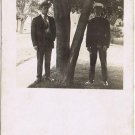 People Postcard RPPC Two Men By Tree Oni In Uniform
