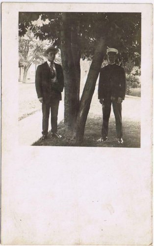 People Postcard RPPC Two Men By Tree Oni In Uniform