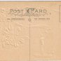 Holiday Postcard Embossed Happy New Year Candle Pine Cones Mistletoe