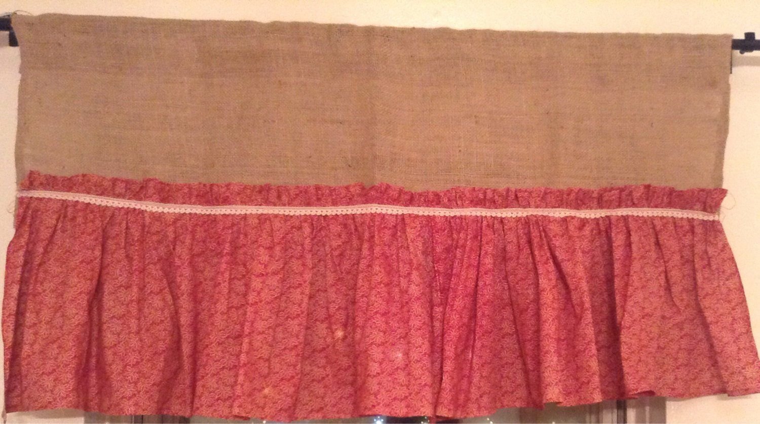 Burlap valance with a dark red Ruffel