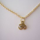 Gold Plated OM or AUM Symbol on a Gold Plated Necklace