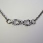 Beautiful Gunmetal and Rhinestone Infinity Symbol on a Stainless Steel Necklace