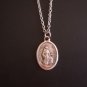 Oxidized Silver St. Francis of Assisi kneeling on a 24" Stainless Steel Necklace